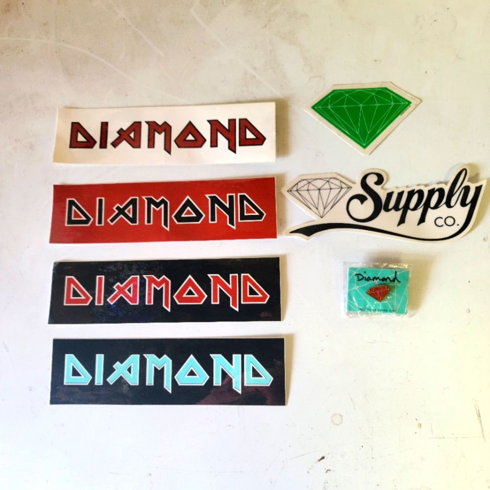 Diamond stickers and a pin.